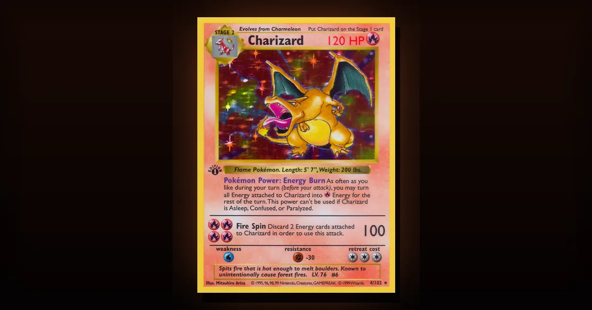 Carta holográfica vintage Pokémon TCG mostrando el efecto rainbow holo bajo luz dramática